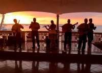 Listening to the band at sunset, Cienfuegos (Cuba)
