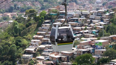 The Skyway crossing over a hillside community - Medellin