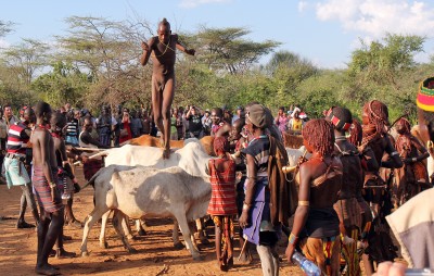 A Hamer youth jumping the bulls
