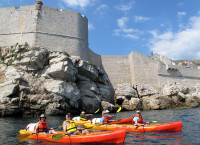 Kayaking beneath the massive walls of Dubrovnik,  Croatia
