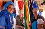 Getting scarves for our camel ride,  Morocco