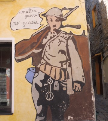 Orgosolo, mural town.  This one says: "Another war? No thanks!"