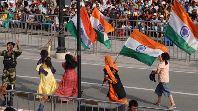 Enthusiastic Indians waving National Flags