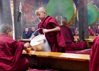 Young monks serving